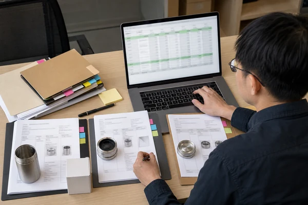 Sourcing specialist normalizing three supplier quotations into one comparison sheet
